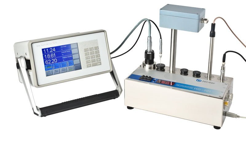 HG-101 humidity calibrator configured with an MBW 473-RP2 chilled-mirror reference hygrometer